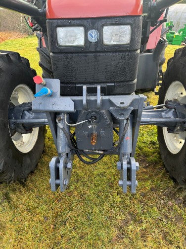 New Holland TS100 avec Trima 4.1P. Prise de force avant/hydraulique.