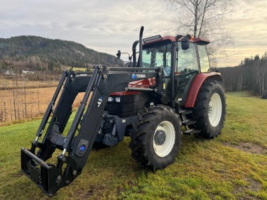 New Holland TS100 avec Trima 4.1P. Prise de force avant/hydraulique.